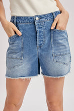 Load image into Gallery viewer, Denim shorts worn by a person on a plain background
