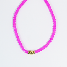 Load image into Gallery viewer, Necklace with pink beads and a gold clasp on a white background