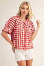 Load image into Gallery viewer, Woman wearing a red and white checkered blouse with puffed sleeves on a plain background