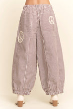 Load image into Gallery viewer, Peace Sign Pinstripe Palazzo Pants
