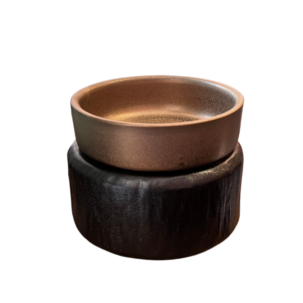 Ceramic container with a brown top and black base on a white background