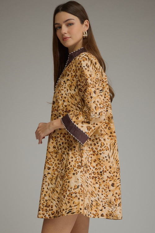 Camel animal print dress front view with contrast trim.