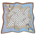 Blue harness houndstooth luxe silky scarf with an elegant printed design.