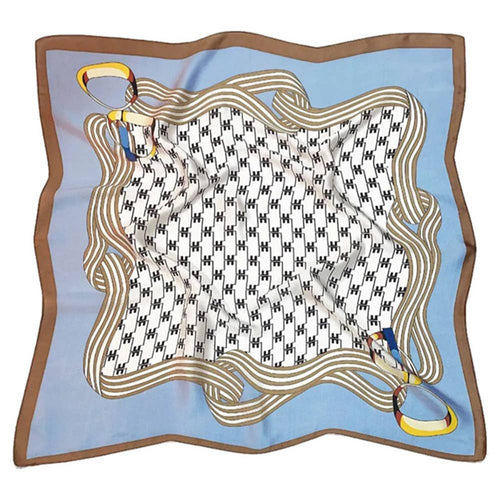Blue harness houndstooth luxe silky scarf with an elegant printed design.