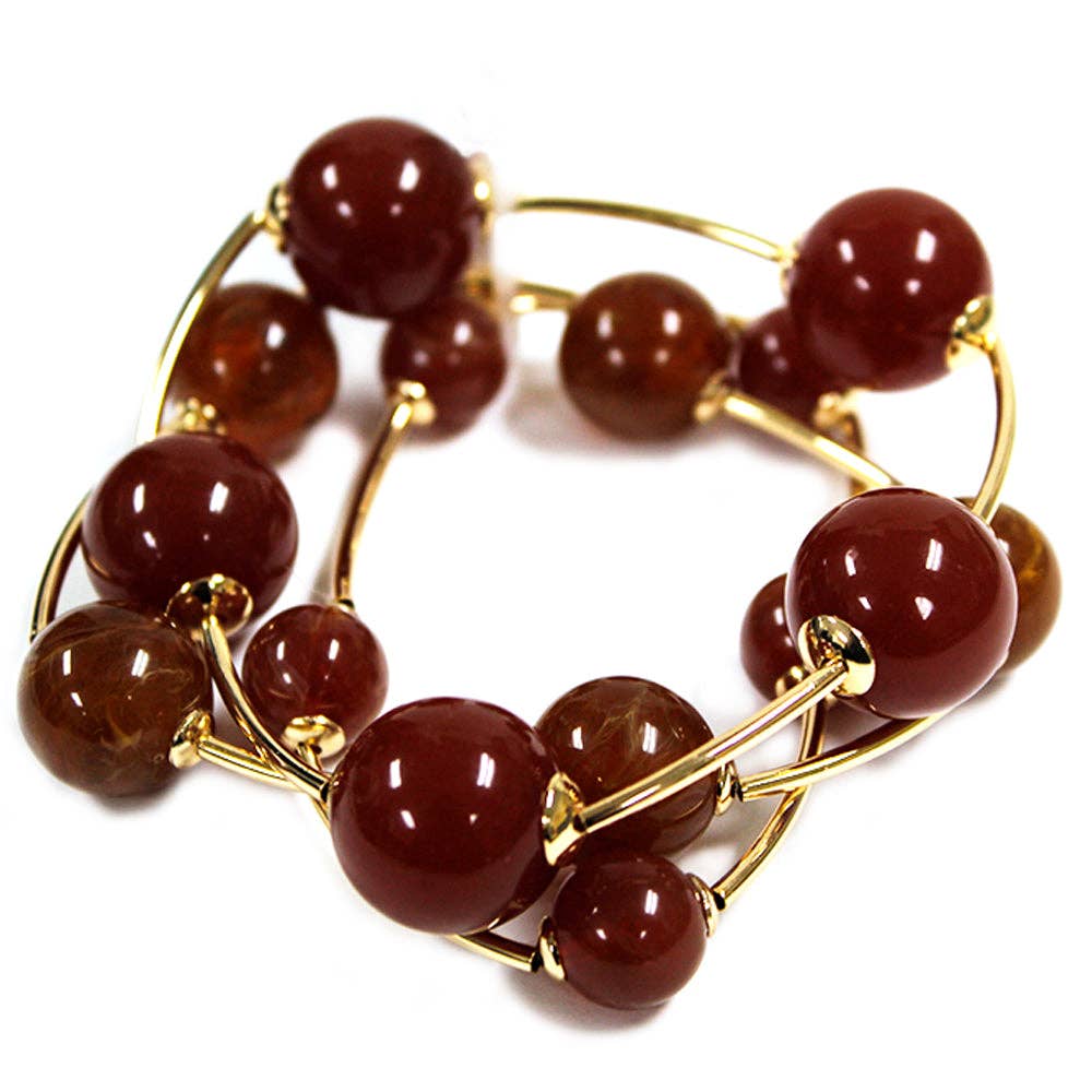 Brown ball stretch bracelets set of 2 with gold bead accents.