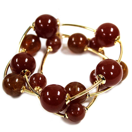 Brown ball stretch bracelets set of 2 with gold bead accents.