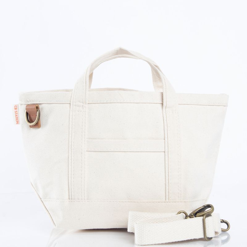 White tote bag with matching pouch on a white background