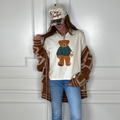 Women's Cozy Plaid Bear Crop Tee featuring a plaid bear graphic on a soft 100% cotton cropped graphic tee.