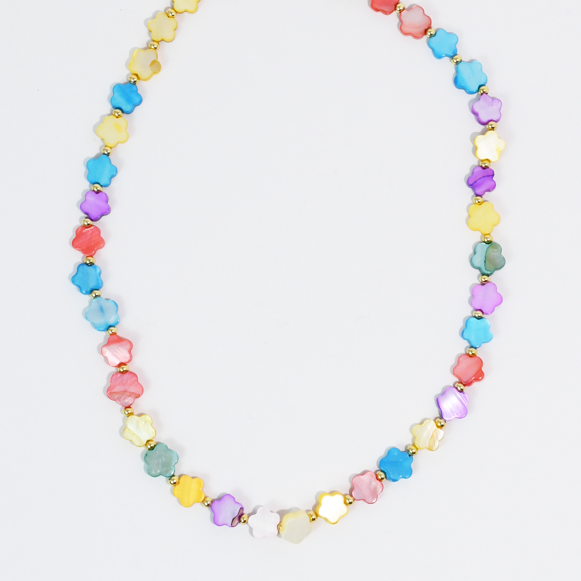 Colorful beaded necklace on a white background