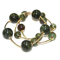 Emerald green ball stretch bracelets set of 2 with gold bead accents.