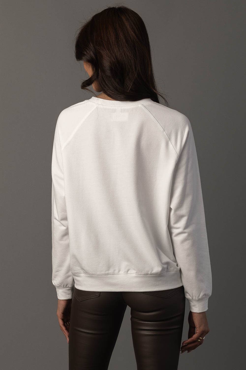 Girl Walking a Turkey Sweatshirt showing ribbed cuffs.