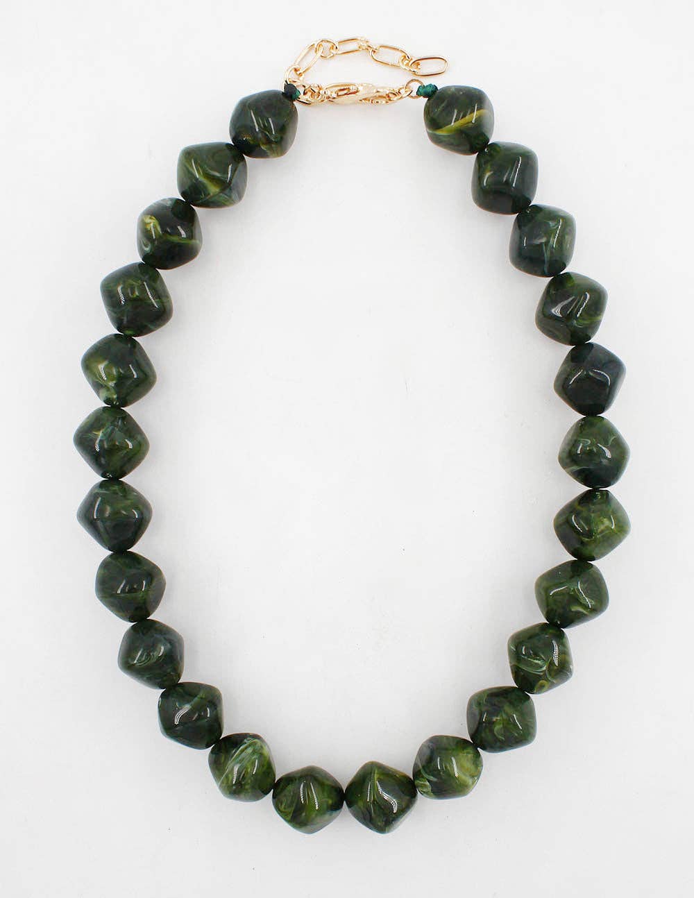 A necklace made of faceted dark green beads with natural marbling, featuring a gold-tone lobster clasp closure, shown on a plain white background.