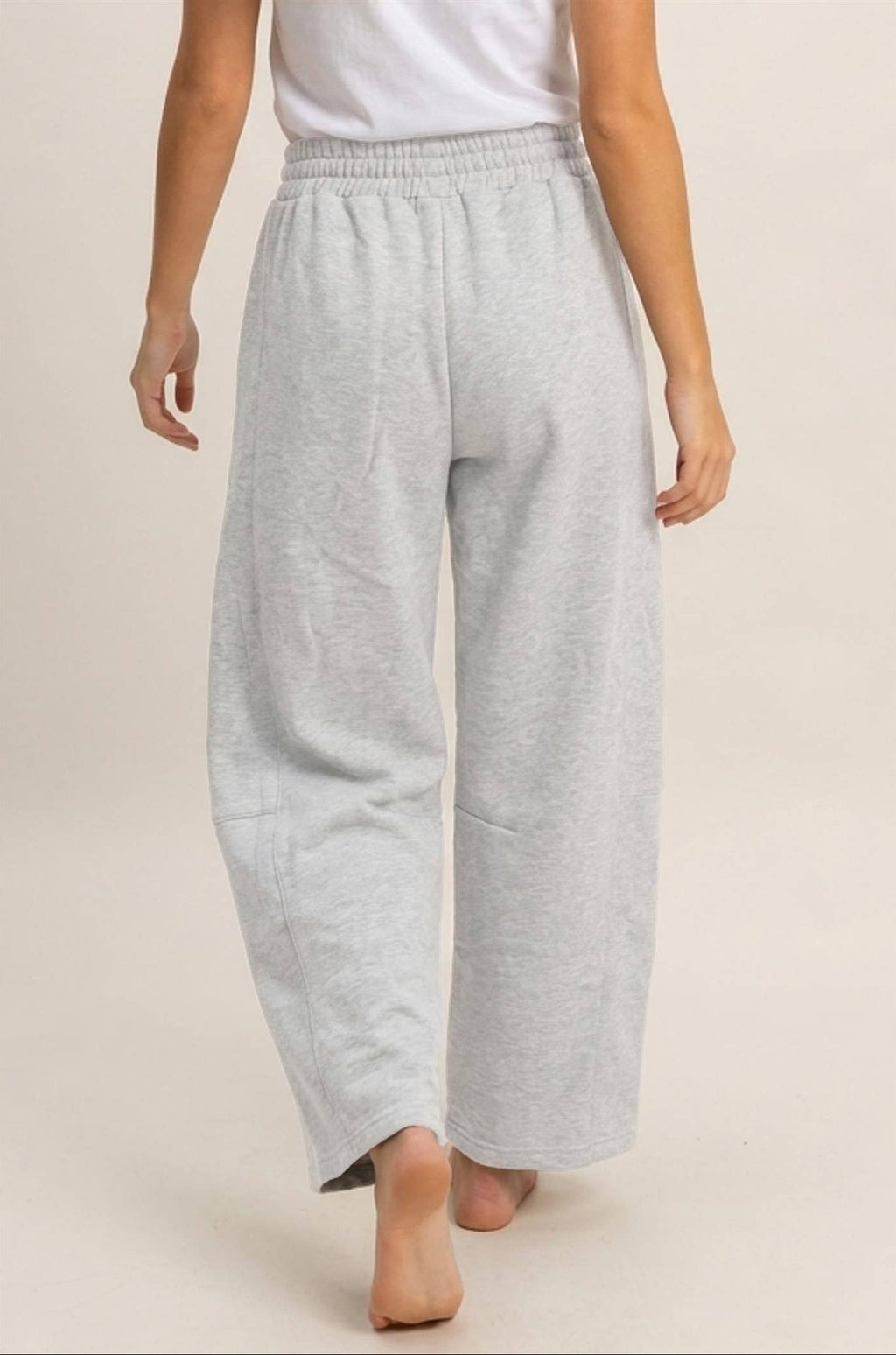 Back view of heather gray barrel sweatpants for women with relaxed silhouette and comfortable everyday fit