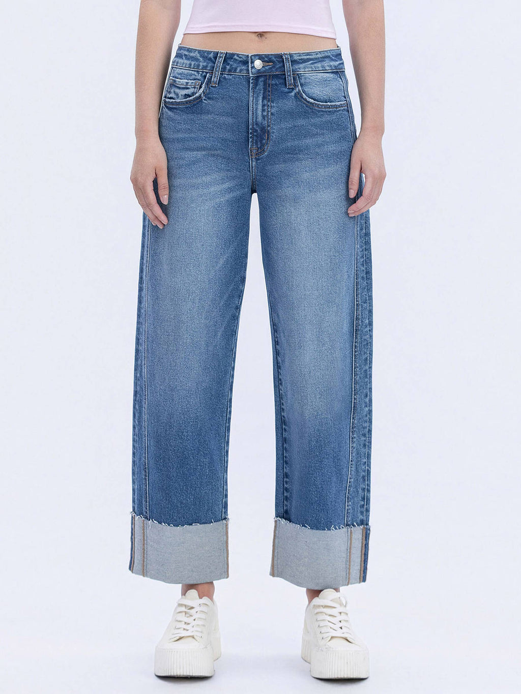 Women's high-rise cuffed barrel leg jeans in a medium wash featuring comfort stretch denim and a cropped length.