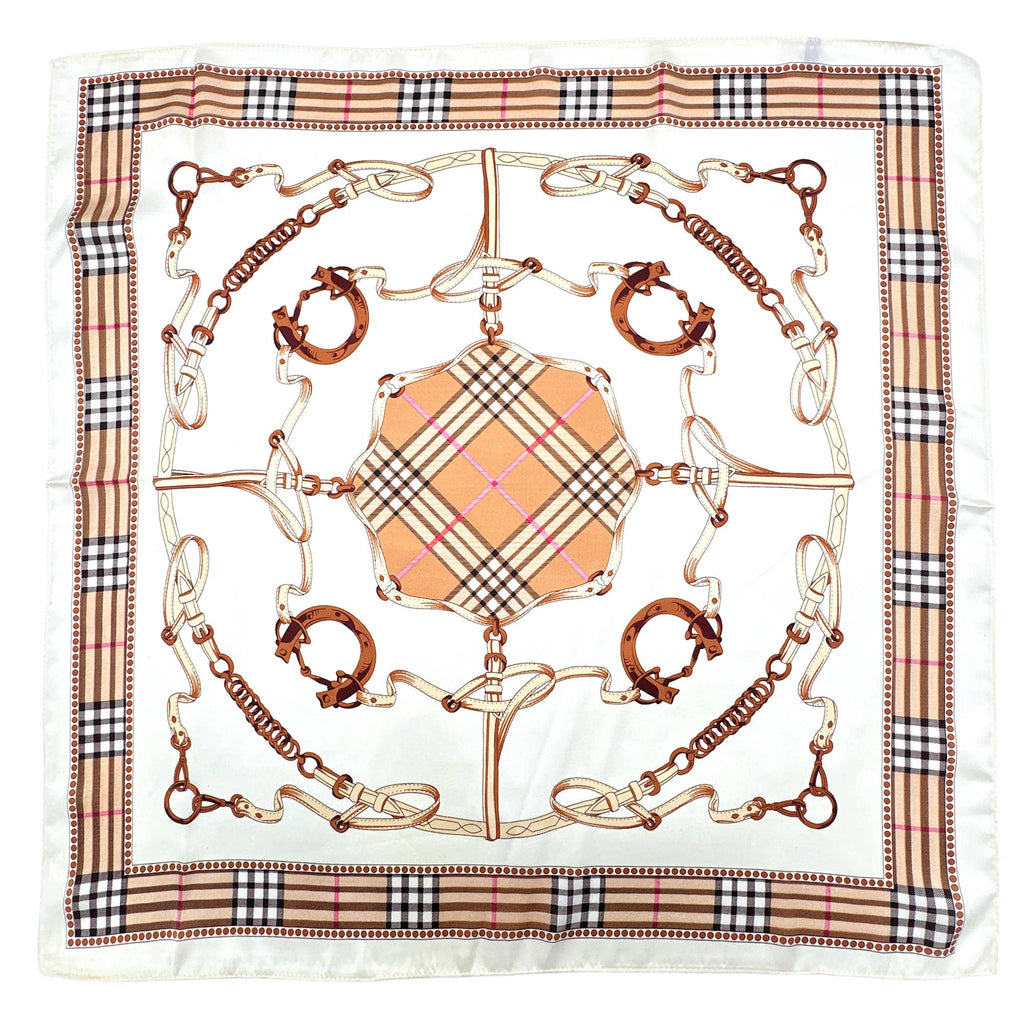 A square silk scarf featuring a central gold and pink plaid motif surrounded by brown horsebit illustrations, with a beige, black, and white check border.