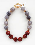 Large maroon and light grey natural stone statement necklace.