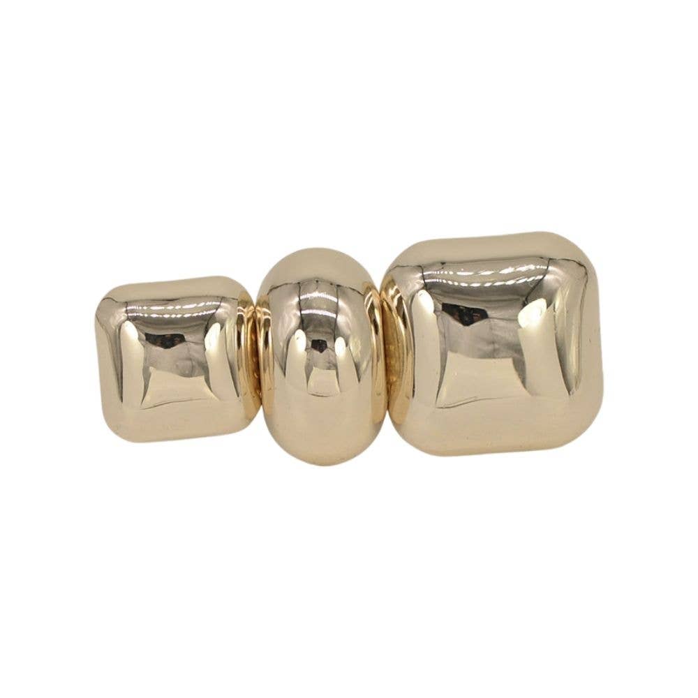 Metal brooch with a refined design for jackets, scarves, and accessories.