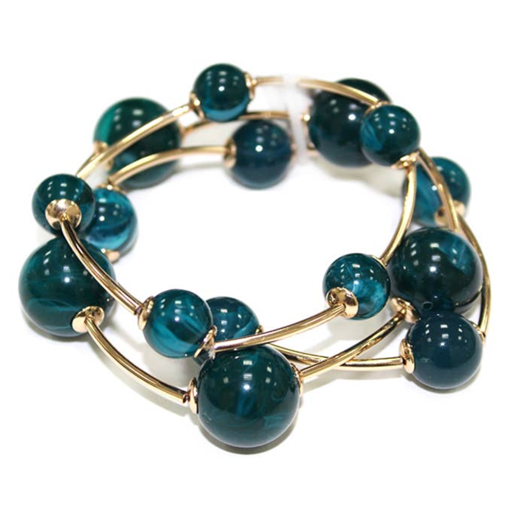 A gold-plated multi-strand bracelet featuring round, polished dark teal-blue beads, shown on a clean white background.