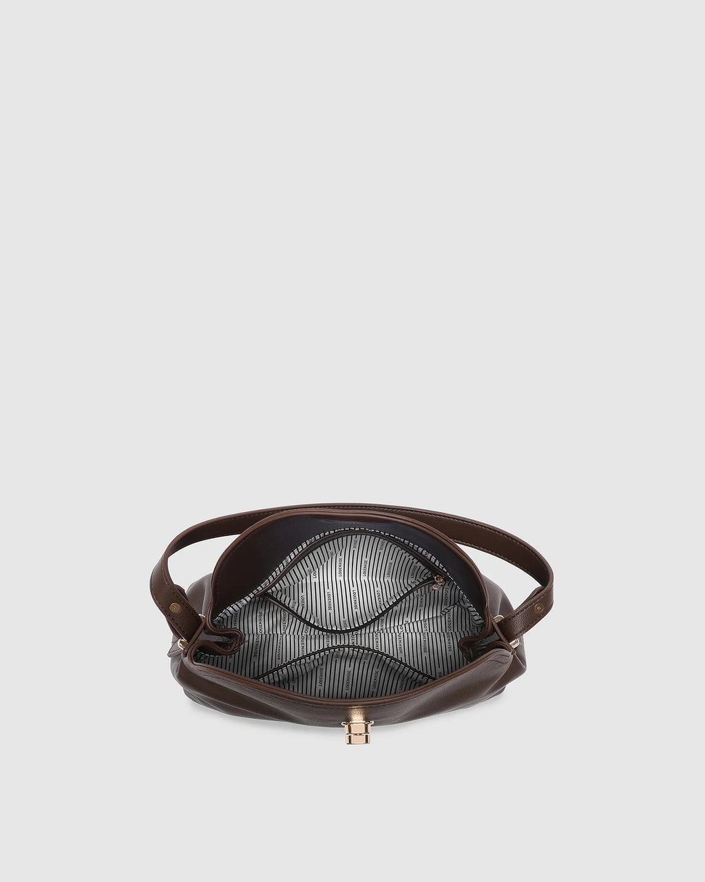 Interior of the Nicole Chocolate handbag with zip and slip pockets