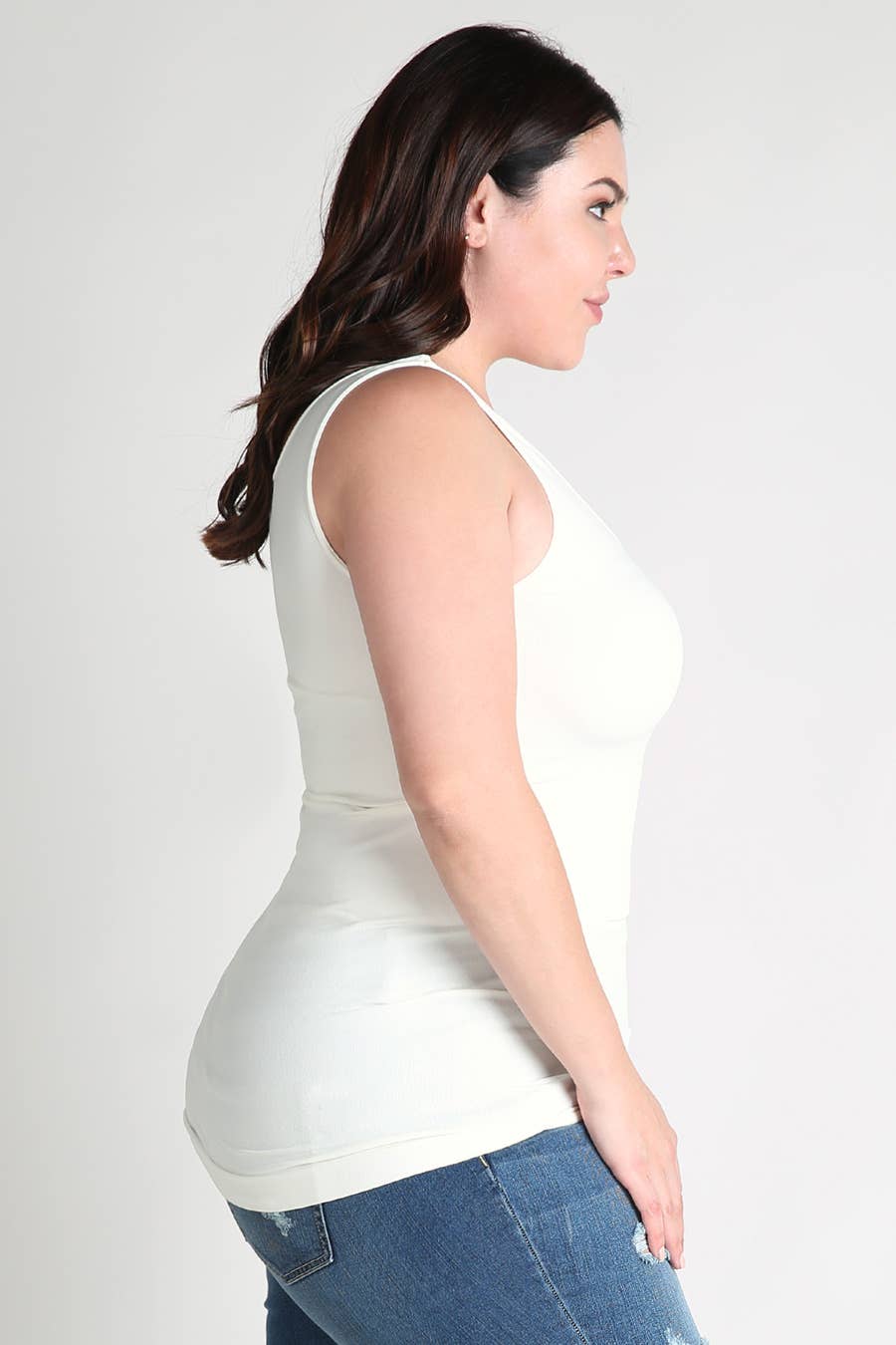 Plus size ivory seamless jersey tank top with scoop neckline and wide comfortable straps.