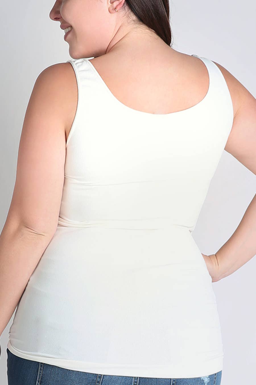 Plus size ivory seamless jersey tank top with scoop neckline and wide comfortable straps.