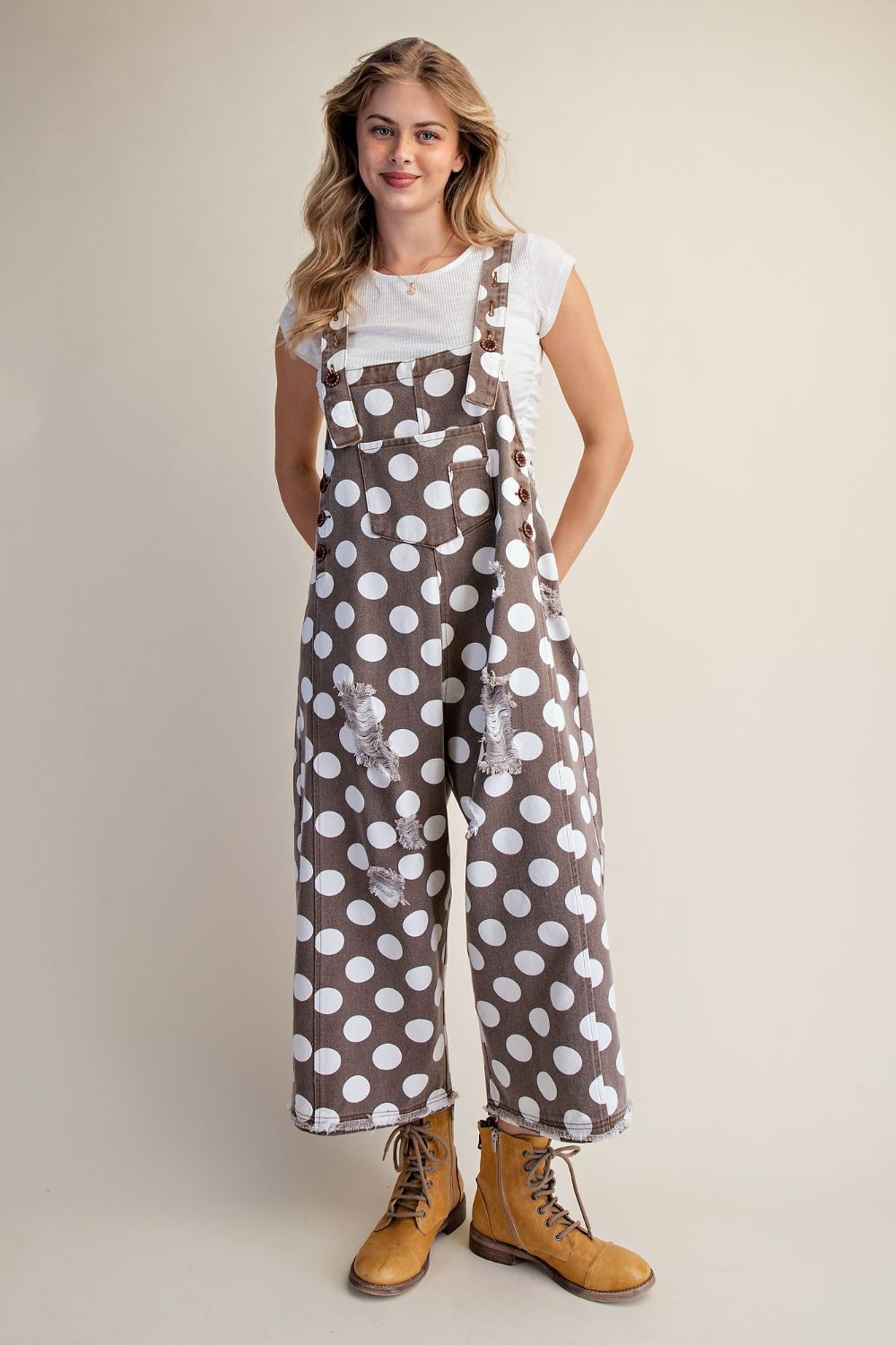 Women's mocha washed twill overalls with large white polka dots and a relaxed wide leg silhouette.
