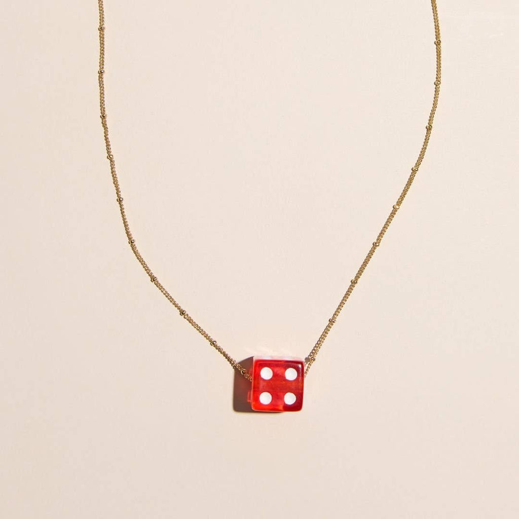 Red dice charm necklace featuring a fun lucky-inspired pendant for everyday wear.
