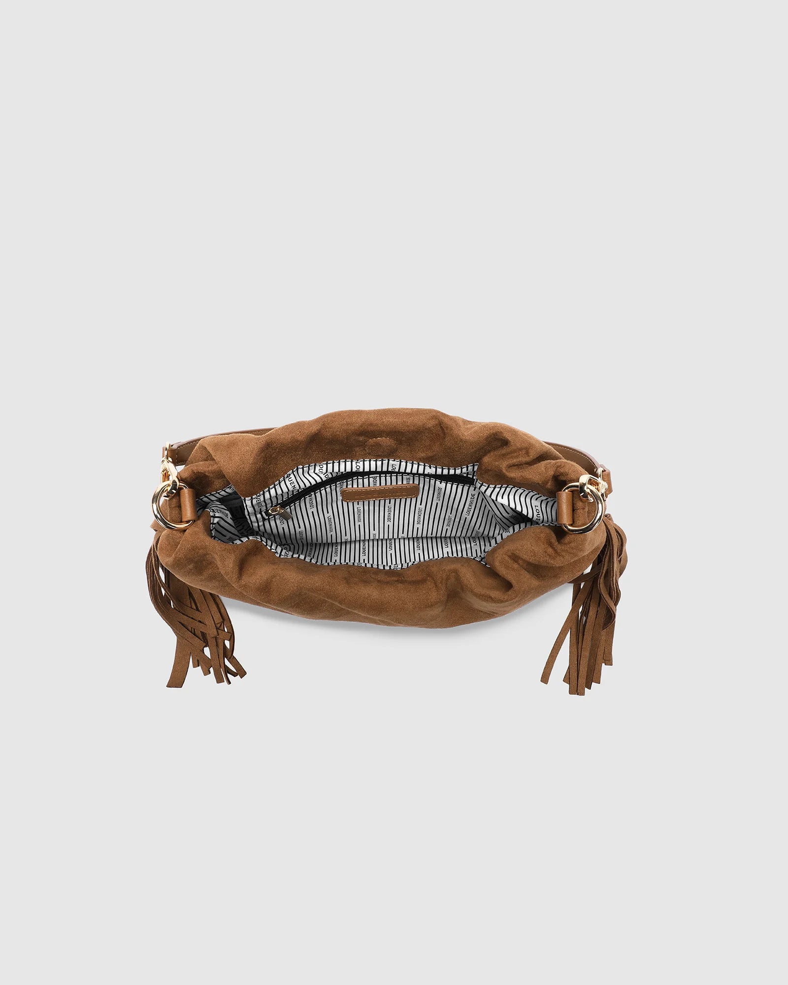 Interior of the Reese Suede Tan shoulder bag with zip and slip pockets