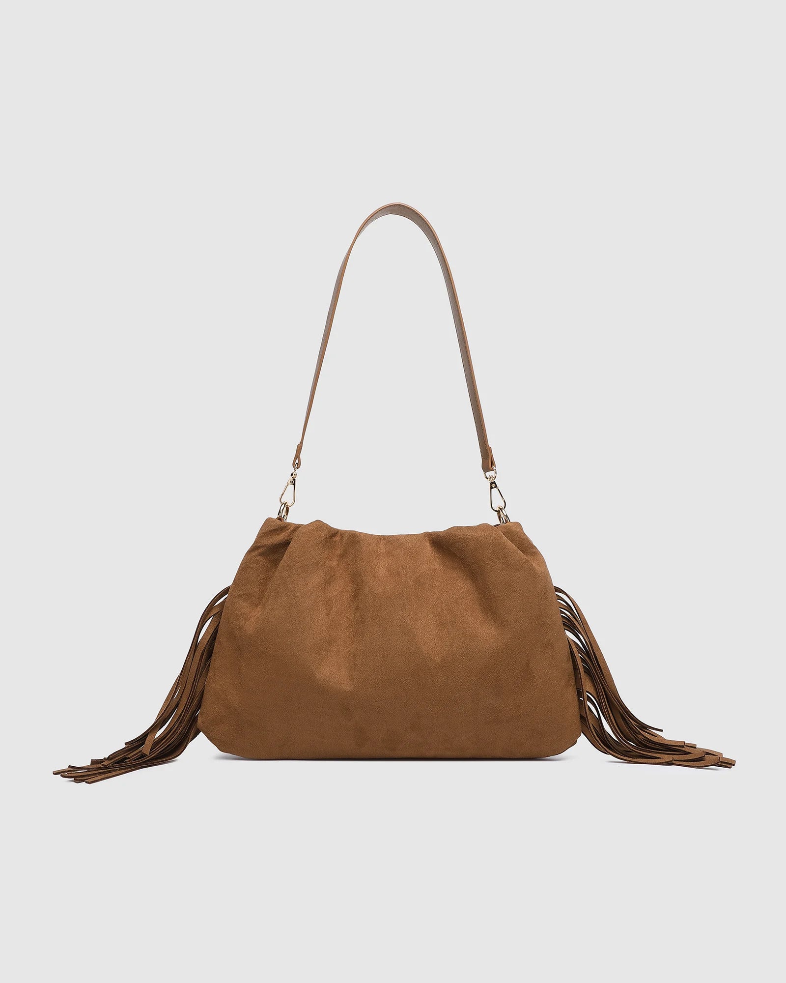 Close-up of faux suede tassel fringe on the Reese bag