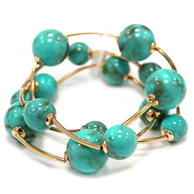 Turquoise ball stretch bracelets set of 2 with gold bead accents.