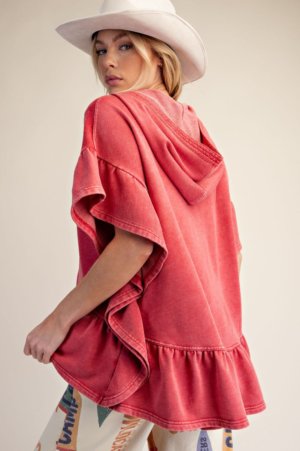 Back view of the Washed Terry Ruffle Bottom Pullover showing the relaxed fit and ruffled peplum hem.