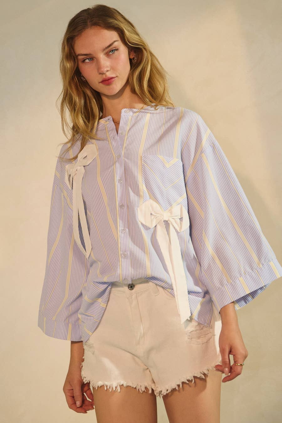 Blue Striped Statement Ribbon Top